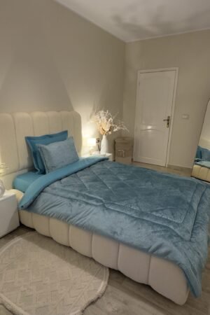 Couette en polaire turquoise (place et demi)